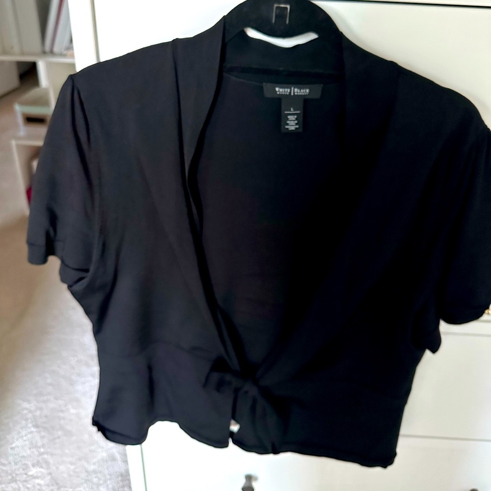 Short sleeved cardigan. Gently worn. Perfect for the fall weather.